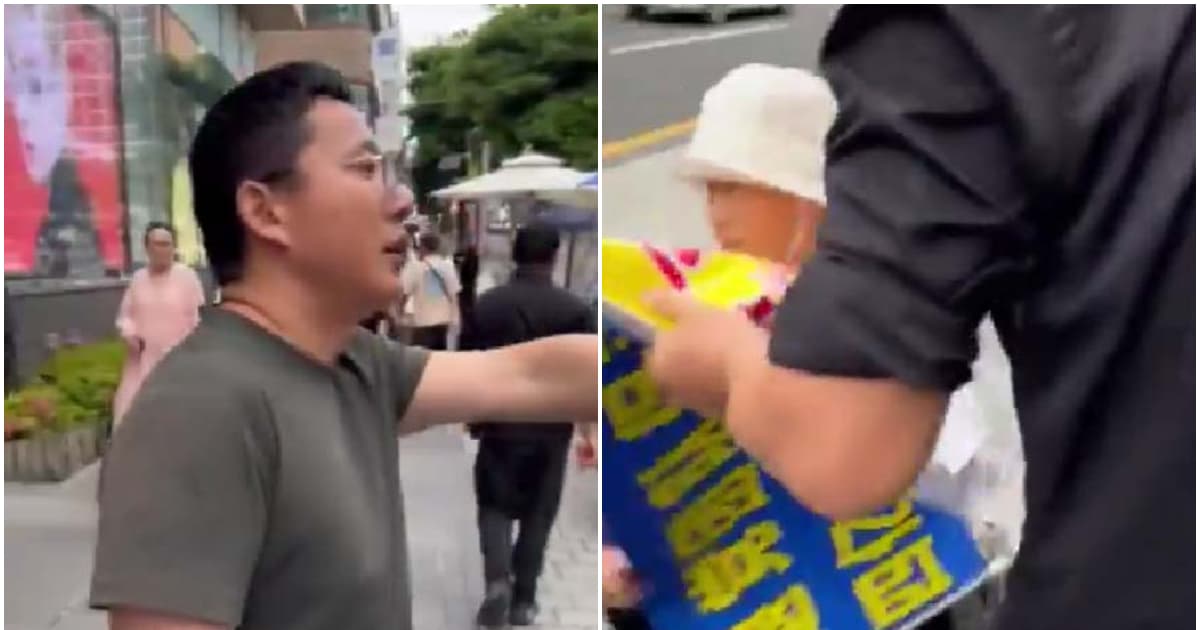中国男攻击韩国法轮功真相点 叫嚣报告中使馆(视频)