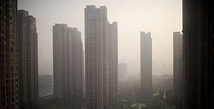 大陆60%上市房企亏损 超四十家房企高层换人